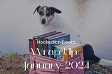 Book stack in front of a dog