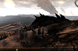 The player party stands on a muddy hillside next to a fallen darkspawn enemy in the opening moments of 2011’s Dragon Age II.