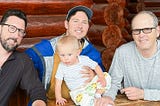 Photo of the author, his sons and grandson