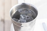 Bucket containing ice as a representation of an S3 bucket with contents
