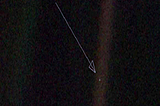 Dot is a photograph of planet Earth taken on February 14, 1990, by the Voyager 1 NASA spacecraft
