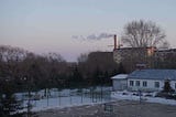 The basketball court in that school (with a northeastern sunset)