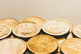 Image showing 5 Rupee coins being metaphored to digtial currencies