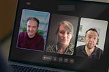 Three people on a video call displayed on a laptop screen. On the left is Antonio wearing a burgundy sweater and glasses, smiling at the camera. In the center is Fail, a woman with blonde hair wearing a leopard print top. On the right is Neil, a man in a black shirt with a slightly surprised expression. The video call interface shows a recording indicator and timestamp of 24:03 at the bottom.