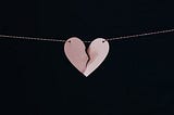 Necklace with a broken love heart