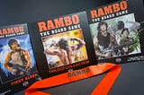 Rambo the Board Game, The Trilogy Collection. Publisher: Everything Epic Games.