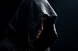 An assassin cloaked in darkness