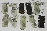 Damaged, recovered bills from the DB Cooper ransom money.