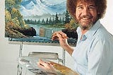 Photo of Bob Ross at easel By Source, Fair use, https://en.wikipedia.org/w/index.php?curid=1632503