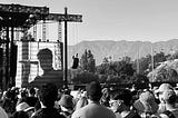 View of the stage. Black and white photo taken from the audience perspective.