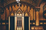 Image of a confession booth in a church