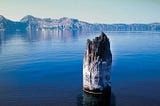 This ghost tree has been floating vertically in Crater Lake for more than 100 years