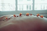 massage-orange-flowers-on-back