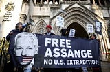 Joe Biden should pardon Julian Assange under the First Amendment