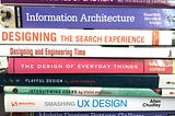 An image of a pile of UX books. Source: medium/@h_locke