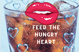 photo of a glass of diet coke with lips on cup that read “feed the hungry heart”