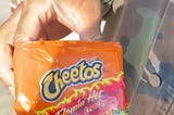 The Meaning Behind “Ode to Flaming Hot Cheetos”