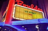 The marquee sign outside the Boulder theatre in Colorado reads ‘UX Strat 2022’.