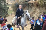 The future Pope Leo XIV rides a white horse among indigenous children in Peru, where he served for 20 years, first as an Augustinian missionary, then as archbishop.