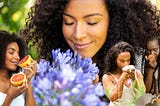 different women smelling different objects