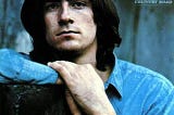 album cover featuring a very serious looking James Taylor in his younger years.