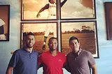 Yadiel Rivera, Martin Maldonado and Ramon Flores pose in front of an amazing photograph of Clemente that Rieder recovered in a dumpster in Puerto. Just one of the many amazing artifacts and stories you'll come across at the museum.