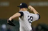 New York Yankees relief pitcher David Carpenter throws during the eighth inning of a baseball game against the Detroit Tigers, Wednesday, April 22, 2015, in Detroit. (AP Photo/Carlos Osorio)