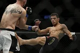 Rafael Dos Anjos Mauls Cowboy Cerrone in Round 1