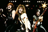 Richie Sambora, Jon Bon Jovi and Alec John Such performing on stage.