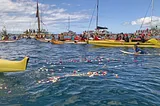 A paddle-out ceremony is held with surfers and boats to commemorate the first anniversary of the Lahaina wildfire, on Maui, Hawaii, August 8, 2024. Photo by Kyodo via Reuters