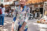 photo of a young lady in a market in India