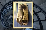 Closeup of a solid, cast brass door knocker in the shape of a lady’s left hand, also known as a westernized Hand of Fatima.