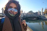 Happy me and breathtaking Prato della Valle behind me — the biggest square in Europe!