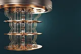 Image of a quantum computer, gold colored metal hanging down in front of a dark blue background