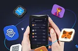 There is an Ellipal Titan Crypto hardware wallet in the picture with various aplications like Metamask around it