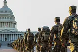 Members of the U.S. National Guard arrive at the U.S. Capitol on January 12, 2021 in Washington, DC.