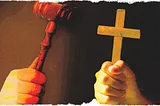A fight between a gavel and a cross