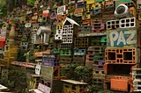 Hand painted & decorated bricks that resamble a the houses of the favela Pereira da Silva, in Rio de Janeiro, Brazil. Picture taken by Oscar Romero with permission of Morrinho Project.