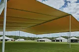 I need to build a 20x40ft temporary structure (20–30ft high) for an event using wood, PVC, or…