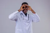 Young african american doctor wearing white coat with