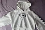 Picture of the white crop-top hoodie described above in the article