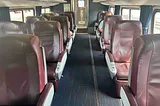 Amtrak Empire Service business class car, showing the 2–1 seat arrangement and what the leather seats look like
