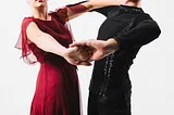 Cropped photo of couple ballroom dancing