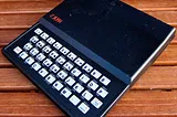 A tatty-looking Sinclair ZX81 home computer.