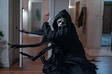 Photo of Ghostface wielding a knife in Scream VI, released in 2023.