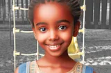 A smiling African girl in a playground.