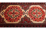 Is symmetry in patterns a sign of a high-quality Persian rug?