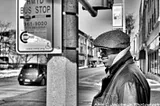 Christopher D. Sims standing at 4th Avenue and 7th Street in Rockford, IL. Photo taken by Alvin Jacobs.