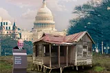 A dilapidated shack. A sign reading ‘Internal Revenue Service Building’ stands next to it. From its eaves depends another sign, reading ‘Internal Revenue Service’ and bearing the IRS logo. From the window of the shack beams the grinning face of billionaire Steve Ballmer. Behind the shack is a DC avenue terminating in the Capitol Dome. Image: Matthew Bisanz (modified) https://commons.wikimedia.org/wiki/File:NYC_IRS_office_by_Matthew_Bisanz.JPG CC BY-SA 3.0 https://creativecommons.org/licenses/b