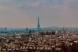 The skyline of Paris with the Eiffel Tower at the very centre.